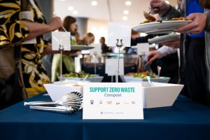 Sign at event directing attendees to compost.