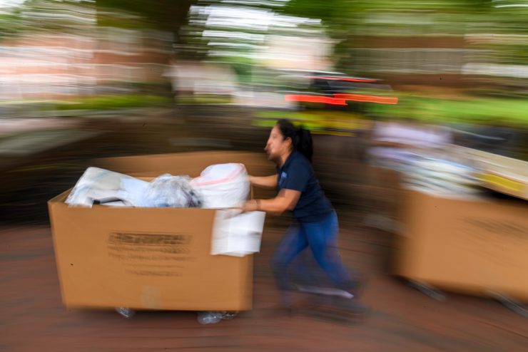 Person pushing cart during 2024 move-in.