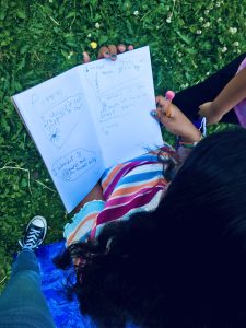 View of a student's notebook during a outdoor class.
